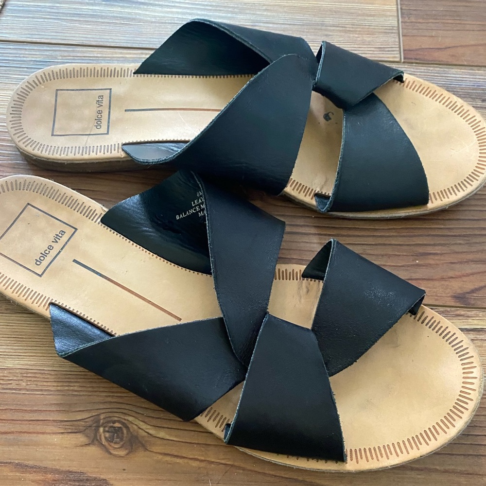 black leather flat dolce vita sandals. good condition only worn a couple times.